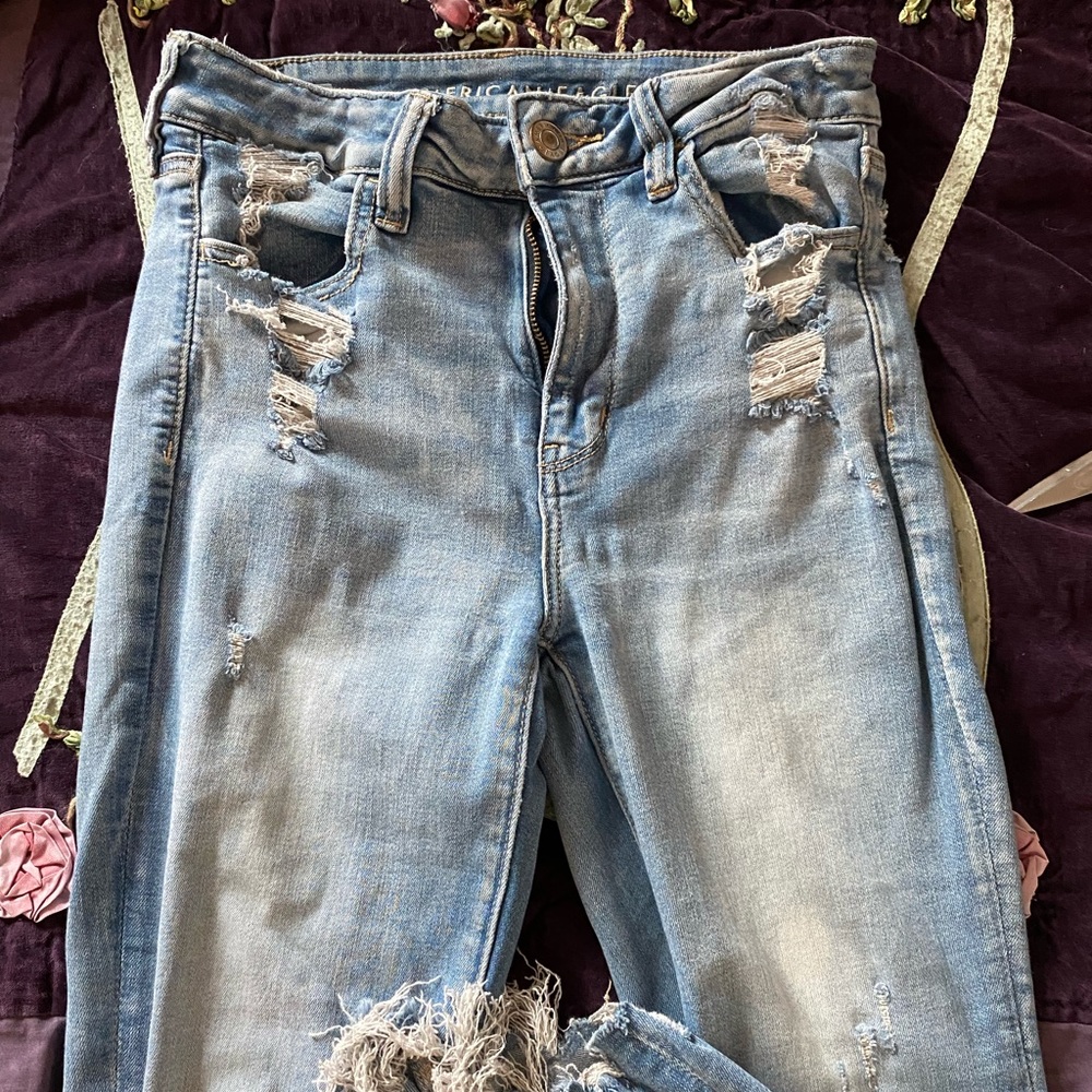 American Eagle jeans bottoms are cropped